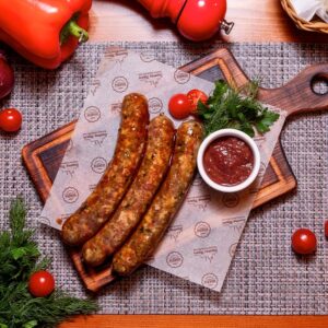 Колбаски из баранины с соусом «Ткемали»